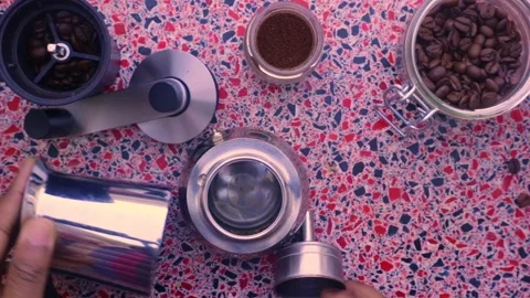 Flat lay view person preparing espresso coffee with a moka pot - 25 se Stock Footage 130980620