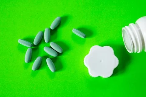 Flat lay view of scattering of pills Stock Photos