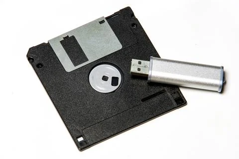 Flat Lay of Vintage Floppy Disk and USB stick Isolated on White Stock Photos