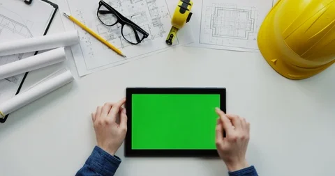 Flat lay of the white desk with constructor's stuff on which female hands 스톡 동영상 96045770