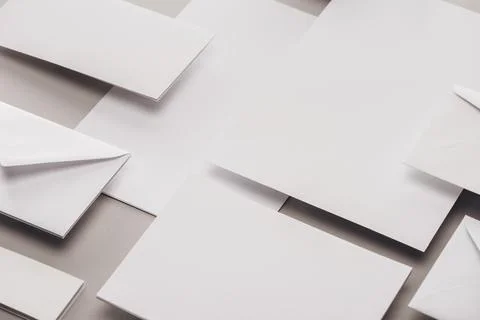 Flat lay white papers envelopes Stock Photos
