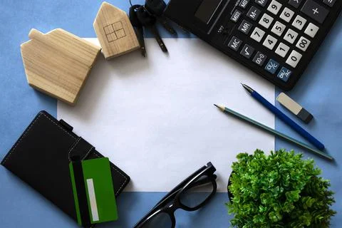 Flat lay with white sheet paper on blue Stock Photos