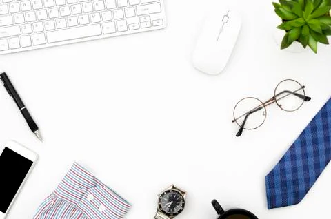 Flat lay white working desk with laptop computer, smartphone and men's Stock Photos
