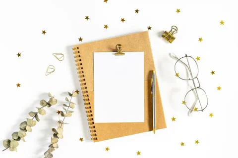 Flat lay of white working table background with office equipment putting on it Stock Photos