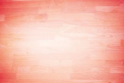 Flat-lay wooden tabletop panel is showing grain patterns with pink gradient Foto stock