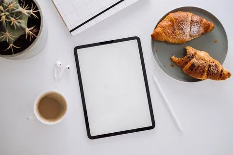 Flat lay of the workplace of the designer illustrator, digital tablet with white Stock Photos