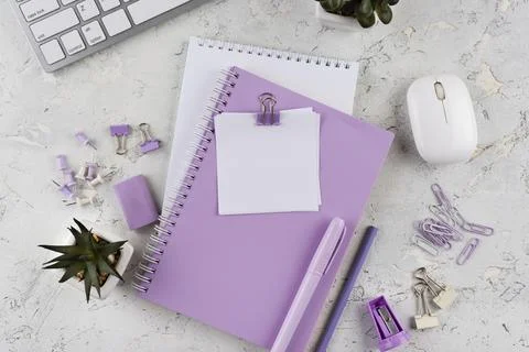 Flat lay workplace elements on marble table Stock Photos