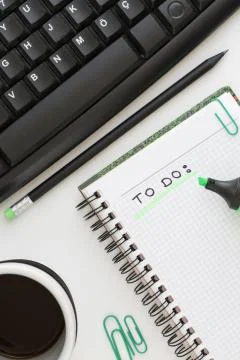 Flat lay workplace on white background Stock Photos