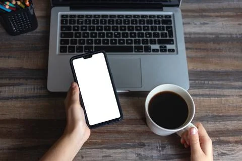 Flat lay workspace desk top view: laptop keyboard, phone with a copy space Stock Photos