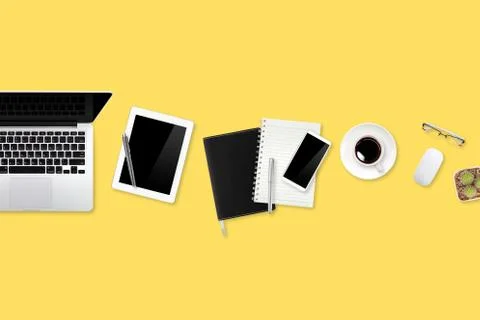 Flat lay workspace table with laptop computer, office supplies, coffee cup Stock Photos