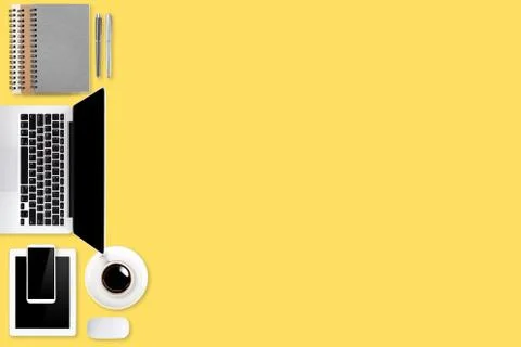 Flat lay workspace table with laptop computer, office supplies, coffee cup Stock Photos