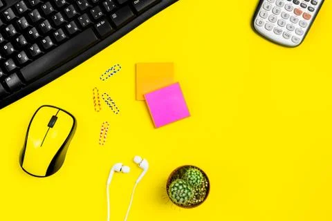 Flat lay workspace yellow computer mouse, office accessory Stock Photos
