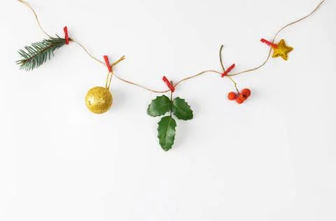 Flat lay of zero waste garland on white background. Christmas 2021 New Year Stock Photos