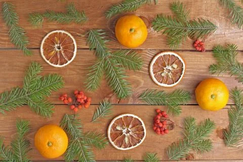Flat layer, a pattern of Christmas symbols on a background of wood. 库存照片