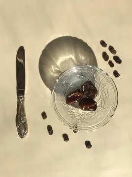Flat laying plate with dates, beautiful shadow in morning light Stock Photos