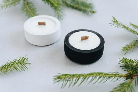 Flat Layout. Side View of Wax Candles in Black and White Plaster Pots. Place  Stock Photos