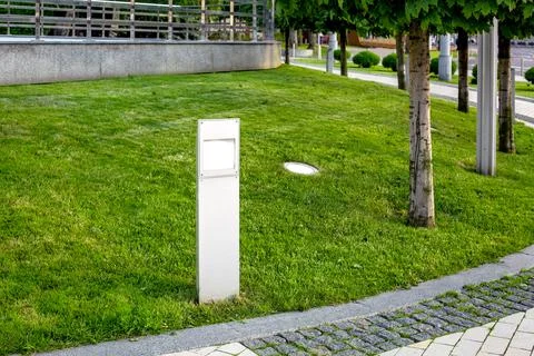 Flat led lantern of ground garden in city park. Stock Photos