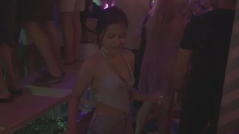 Flat Log Profile Medium shot of sexy woman dancing in nightclub 스톡 동영상 337126140