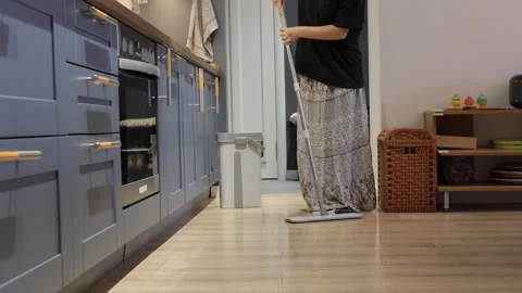 Flat Mop Cleaning Along Kitchen Cabinets Stock Footage 335589197