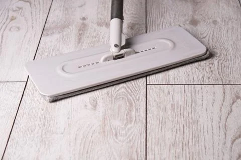 Flat mop for cleaning laminate flooring, close-up Фото