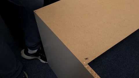 Flat pack wardrobe assembly. Stock Footage 169949380