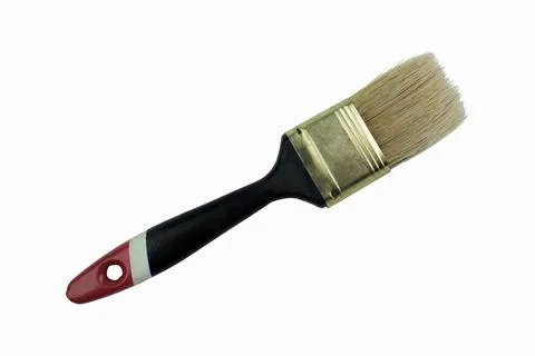 Flat paint brush with a rubberized black, red and white handle Isolated on wh Stock-Fotos