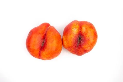 Flat peach on a white background. Top view. Stock Photos