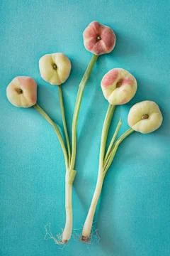 Flat peaches Stock Photos