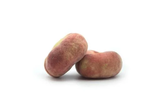 Flat peaches on white background Stock Photos