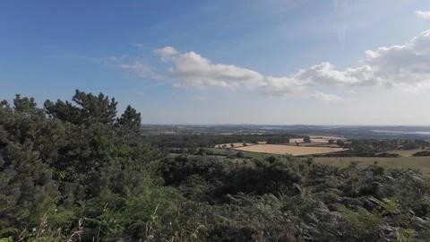 Flat profile panoramic view of countryside valley under cloudy sky Stock Footage 340444370