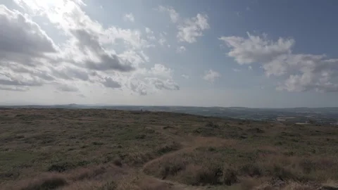 Flat profile panoramic view over green countryside fields from hill Stock Footage 340445009
