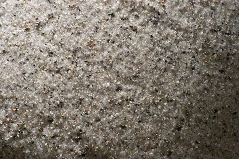 Flat quartz sand with top left lighting Stock Photos