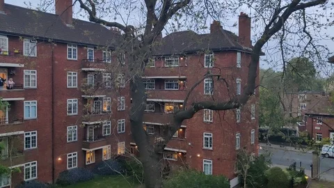 FLAT RESIDENTS CLAPPING FOR NURSES AND ESSENTIAL WORKERS COVID19 LOCKDOWN UK Stock Footage 128543948