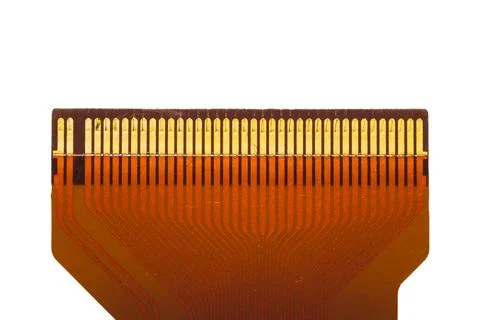 Flat ribbon cable isolated on white. flat connector with golden pins macro. c Stock Photos