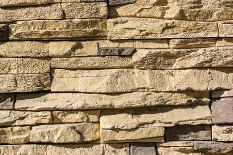 Flat rocks layered to form a solid wall 스톡 사진