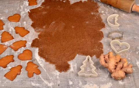 Flat rolled Raw gingerbread dough for cooking Christmas cookies Stock Photos