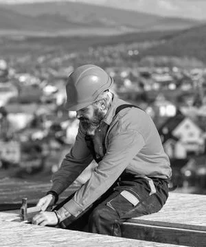 Flat roof installation. Roofer constructing new roof. Construction building 스톡 사진