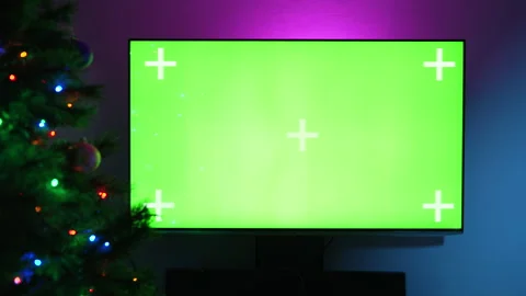 Flat Screen TV With Green Screen Composite. Christmas Tree Decorated In The Stock Footage 210143915