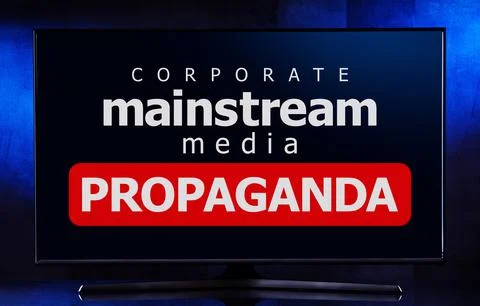 A flat-screen TV set displaying the watchword: mainstream media propaganda Stock Photos