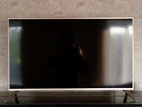 A flat -screen TV standing on the top of the table Stock-Fotos