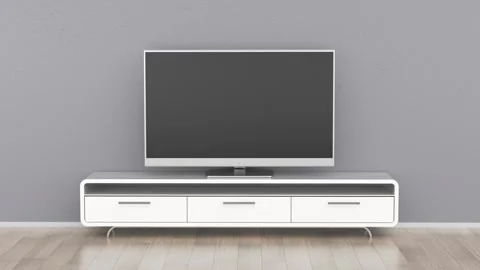 Flat screen TV on white modern cabinet Stock Footage 317611921