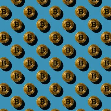Flat seamless pattern of bitcoin coins on a blue background, cryptocurrency Stock Photos