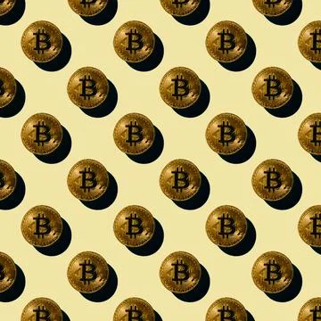 Flat seamless pattern of bitcoin coins on a yellow background, cryptocurrency Stock Photos