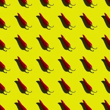 Flat seamless pattern of red hot pepper on a yellow background Stock Photos