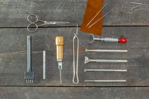 Flat set of leather tool kit for beginners. Leather instrument set. Stock Photos