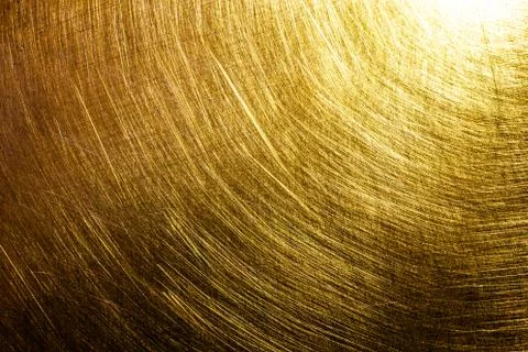 Flat shiny brushed brass texture with random pattern Photos