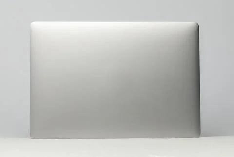 Flat silver light weight  notebook computer standing up showing luxury design 스톡 사진