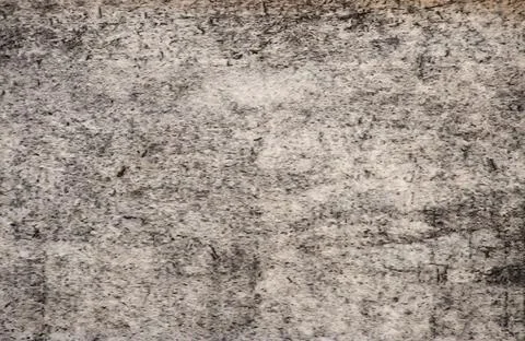 A flat surface of natural light gray stone with traces of processing and tint Foto stock