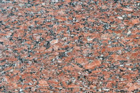 The flat surface of a natural marble or brown granite slab. Foto stock