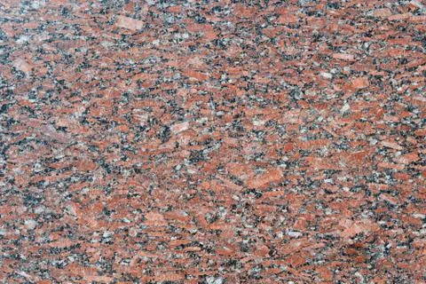 The flat surface of a natural marble or brown granite slab. Foto stock